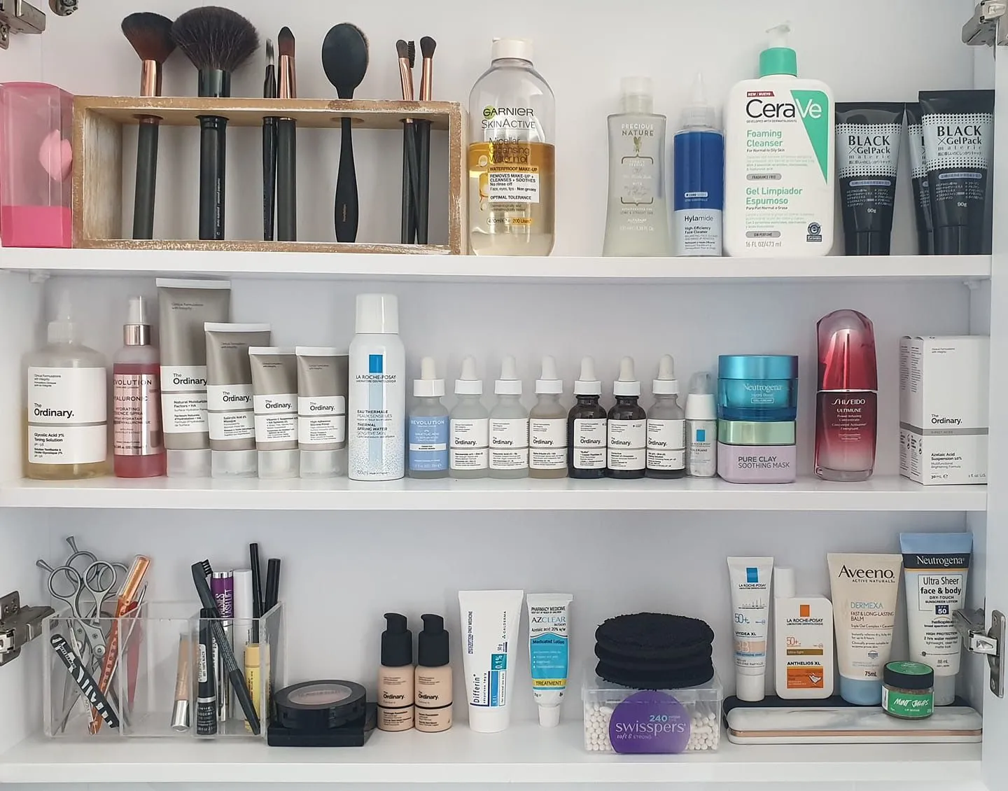 Organized skincare shelf with products and brushes. - Ferulic Acid in Skincare: Benefits & How to Use It 2026 - Zicail Organized skincare shelf with products and brushes. - Ferulic Acid in Skincare: Benefits & How to Use It 2026 - Zicail