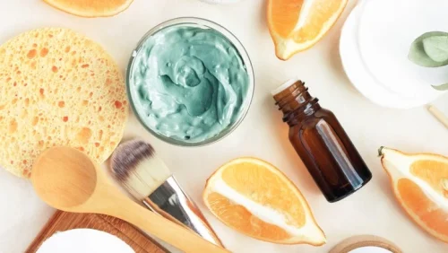 Natural skincare items with oranges and green face mask - Waterless Skincare: Benefits, Products & Sustainability - Zicail