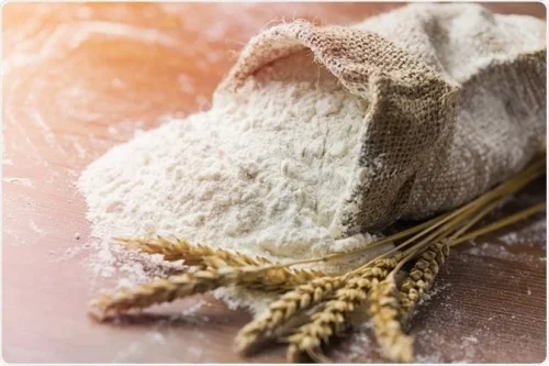 Burlap sack of white flour spilling onto a rustic surface with wheat - Is Sunscreen Gluten-Free? Safe Options & Key Ingredients 2026 - Zicail Burlap sack of white flour spilling onto a rustic surface with wheat - Is Sunscreen Gluten-Free? Safe Options & Key Ingredients 2026 - Zicail