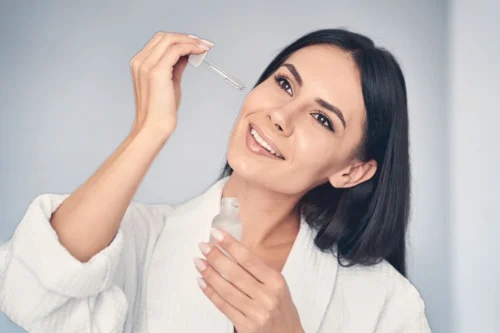Woman undergoing a Hyaluronic Acid facial treatment - How to Use Vitamin C and Hyaluronic Acid Together for Better Skin 2026 - Zicail
