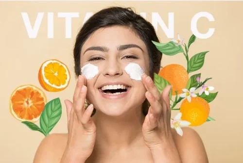 A woman smiles while proudly displaying a vitamin C bottl - Is Vitamin C Good Under Makeup? Tips for Glowing Skin 2026 - Zicail