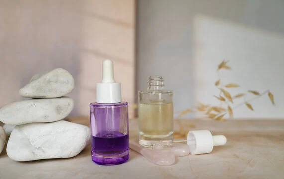 Purple Bakuchiol serum bottles placed on a stone surface - Functional Ingredients for Sensitive Skin Care 2026 - Zicail Purple Bakuchiol serum bottles placed on a stone surface - Functional Ingredients for Sensitive Skin Care 2026 - Zicail