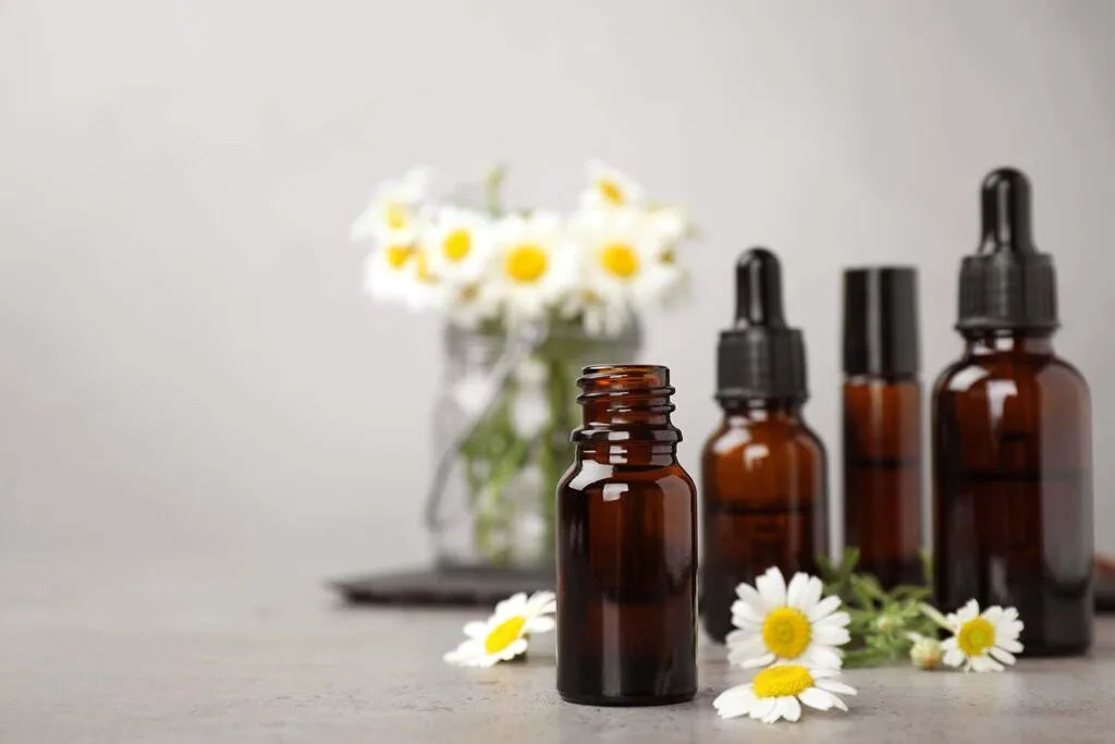 Chamomile for skin in amber essential oil bottles - Chamomile in Skincare: Benefits & How to Use 2026 - Zicail Chamomile for skin in amber essential oil bottles - Chamomile in Skincare: Benefits & How to Use 2026 - Zicail