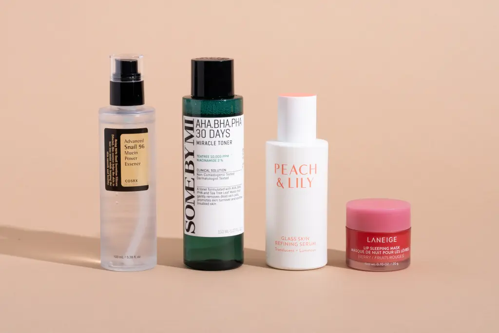 Korean skincare products arranged with flowers - Are Korean Skincare Products Better for Asians? 2026 - Zicail