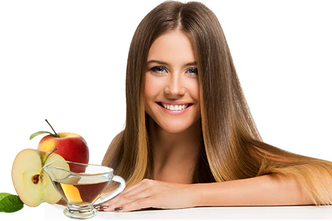 Woman with shiny hair beside apples and cider for oily hair care - How to Treat and Manage Oily Hair？ 2026 - Zicail