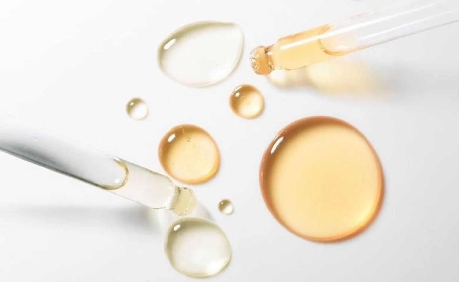 Close up of skincare oils in pipettes and drops - Beta-Glucan in Skincare: Benefits & How to Use It 2026 - Zicail
