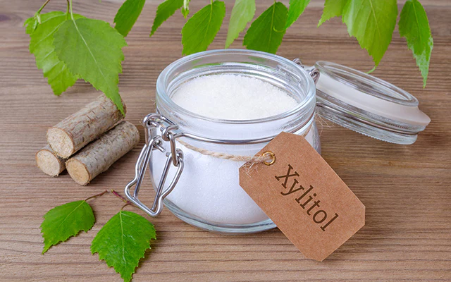 Xylitol in a jar labeled with a tag - Xylitol in Skincare: Hydration, Benefits & Uses Explained 2026 - Zicail