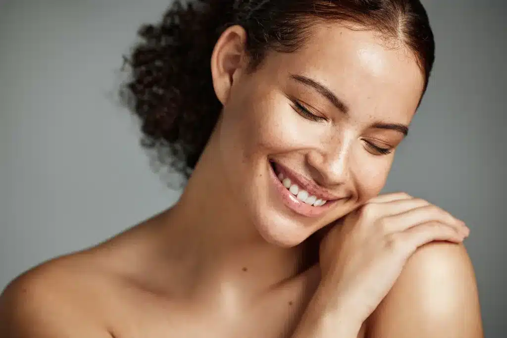 A woman with radiant clear skin showcasing a healthy glow - Fermented Oils in Skincare: Benefits & Best Practices 2026 - Zicail
