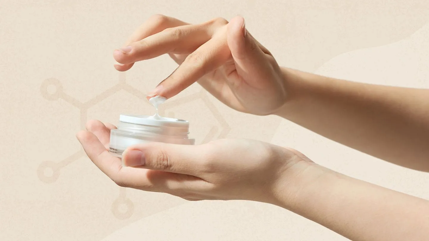 Hand scooping cream enriched with caffeic acid in skincare - Caffeic Acid in Skincare: Benefits & How to Use 2026 - Zicail