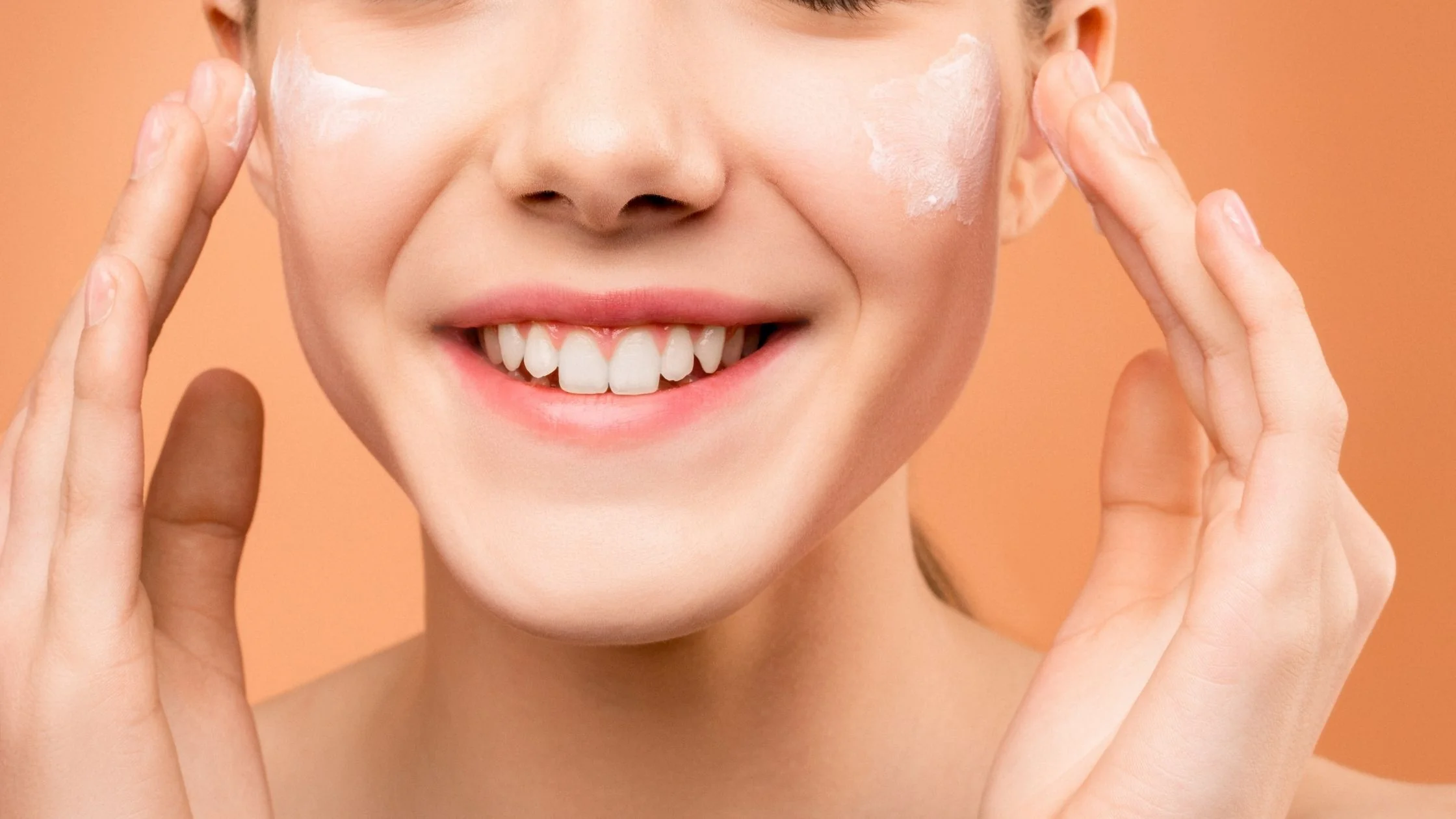 Smiling girl applying Acetyl Glucosamine for skin softness - Acetyl Glucosamine for Skin: Benefits & Uses 2026 - Zicail