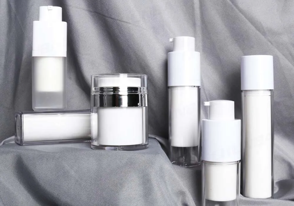 Elegant airless and cream pump bottles in white - Airless Bottles vs Pump Bottles: Which Fits Your Formula? 2026 - Zicail